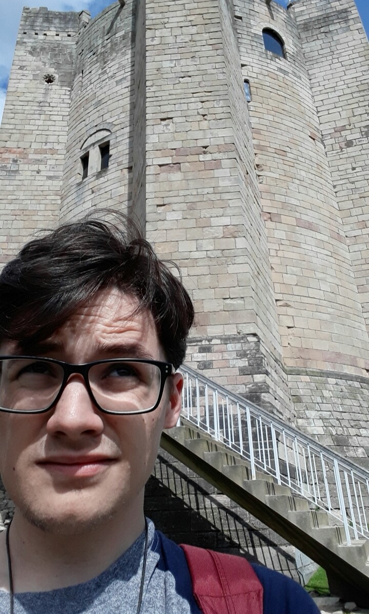 conisbrough castle's keep, including the photographer in the foreground